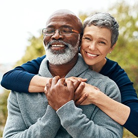 Happy Wheaton patient smiling with partner