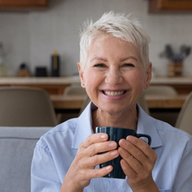 Woman smiling on a couch