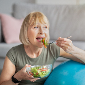 Woman eating a salad