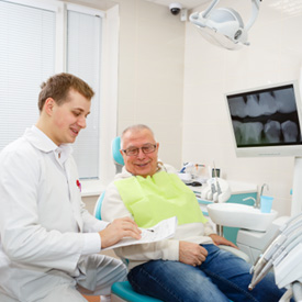 Man smiling at the dentist